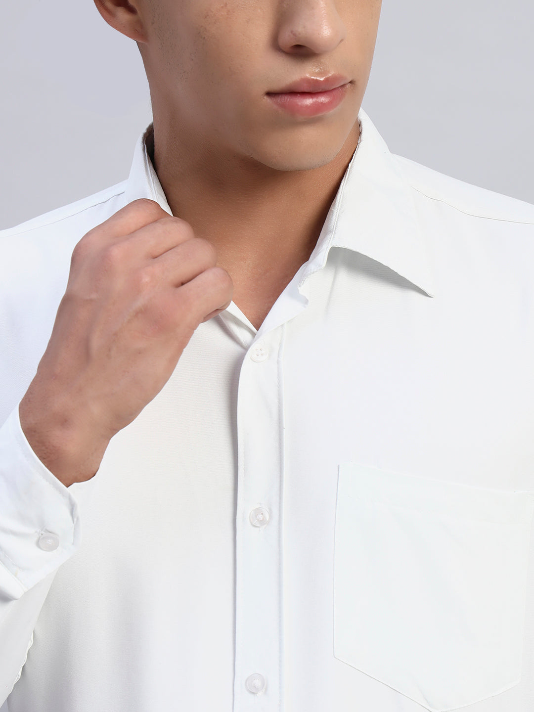 Close-up of men's white formal shirt fabric texture, button placket, and chest pocket — SMOKHEAD premium workwear quality