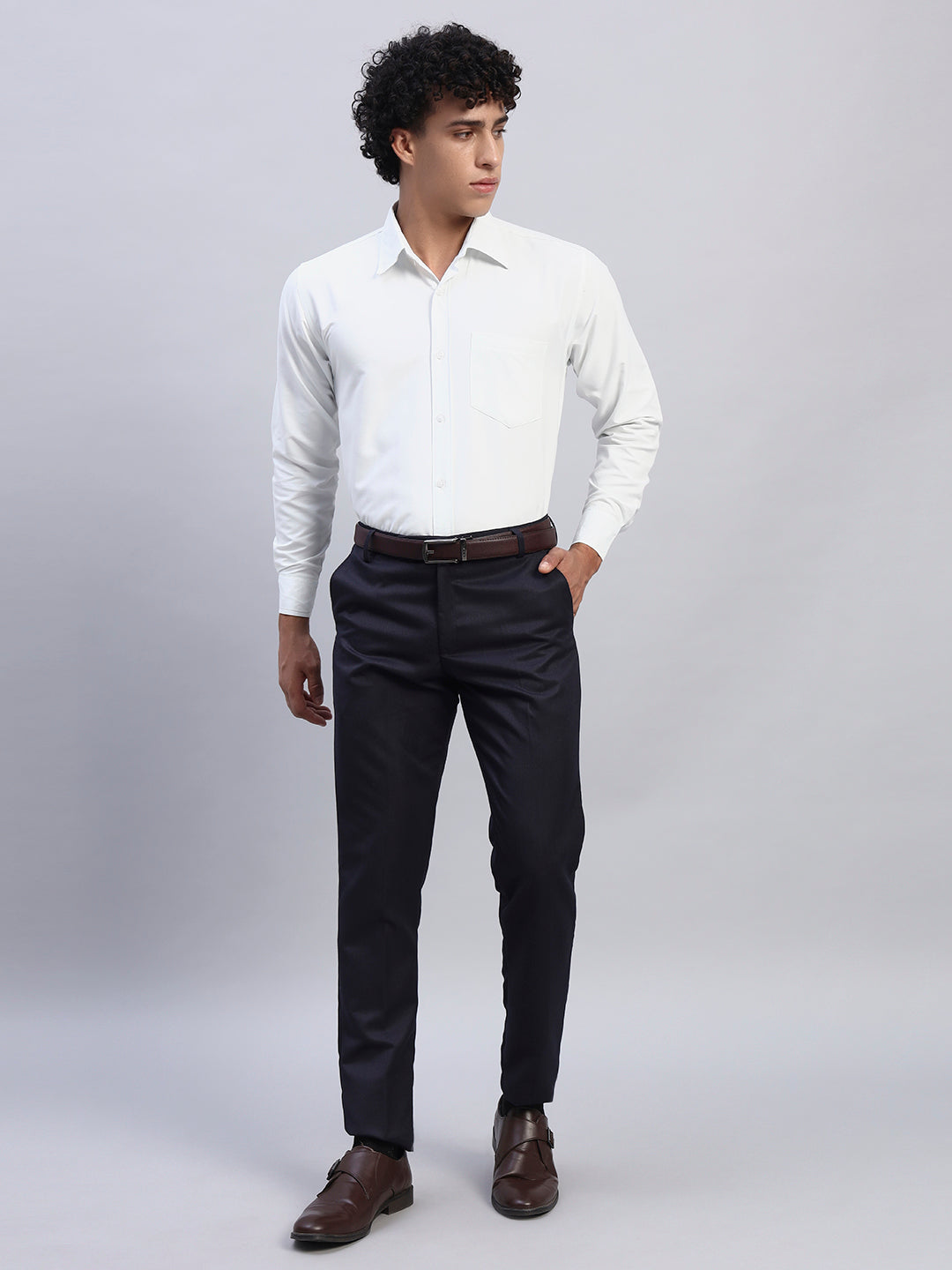 Full look: Men's white formal full-sleeve shirt paired with navy trousers, brown leather belt, and office briefcase — SMOKHEAD business formal office outfit