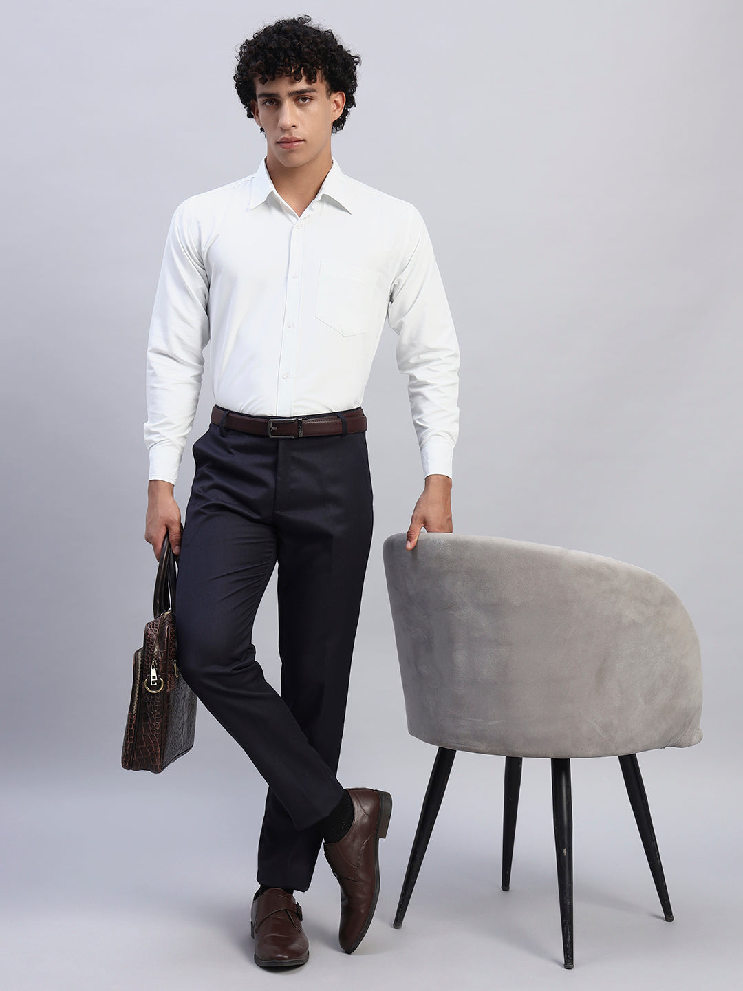 Full look: Men's white formal full-sleeve shirt paired with navy trousers, brown leather belt, and office briefcase — SMOKHEAD business formal office outfit
