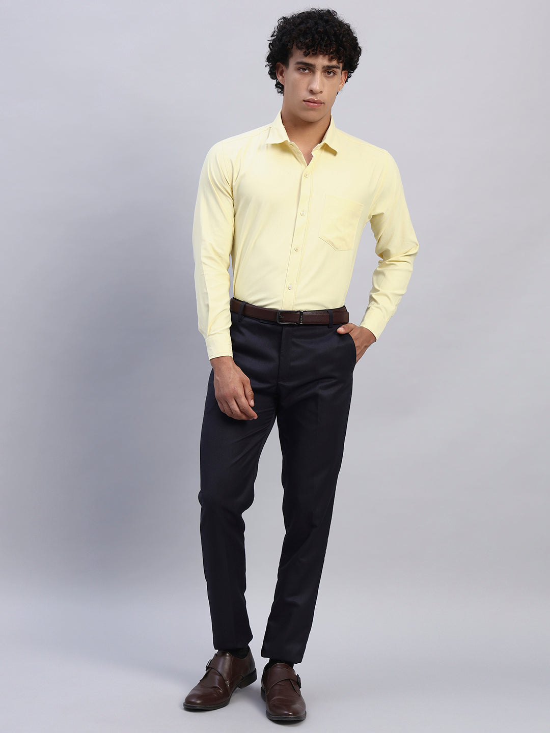 Full look: Men's pastel yellow formal full-sleeve shirt styled with black formal trousers — SMOKHEAD professional office outfit