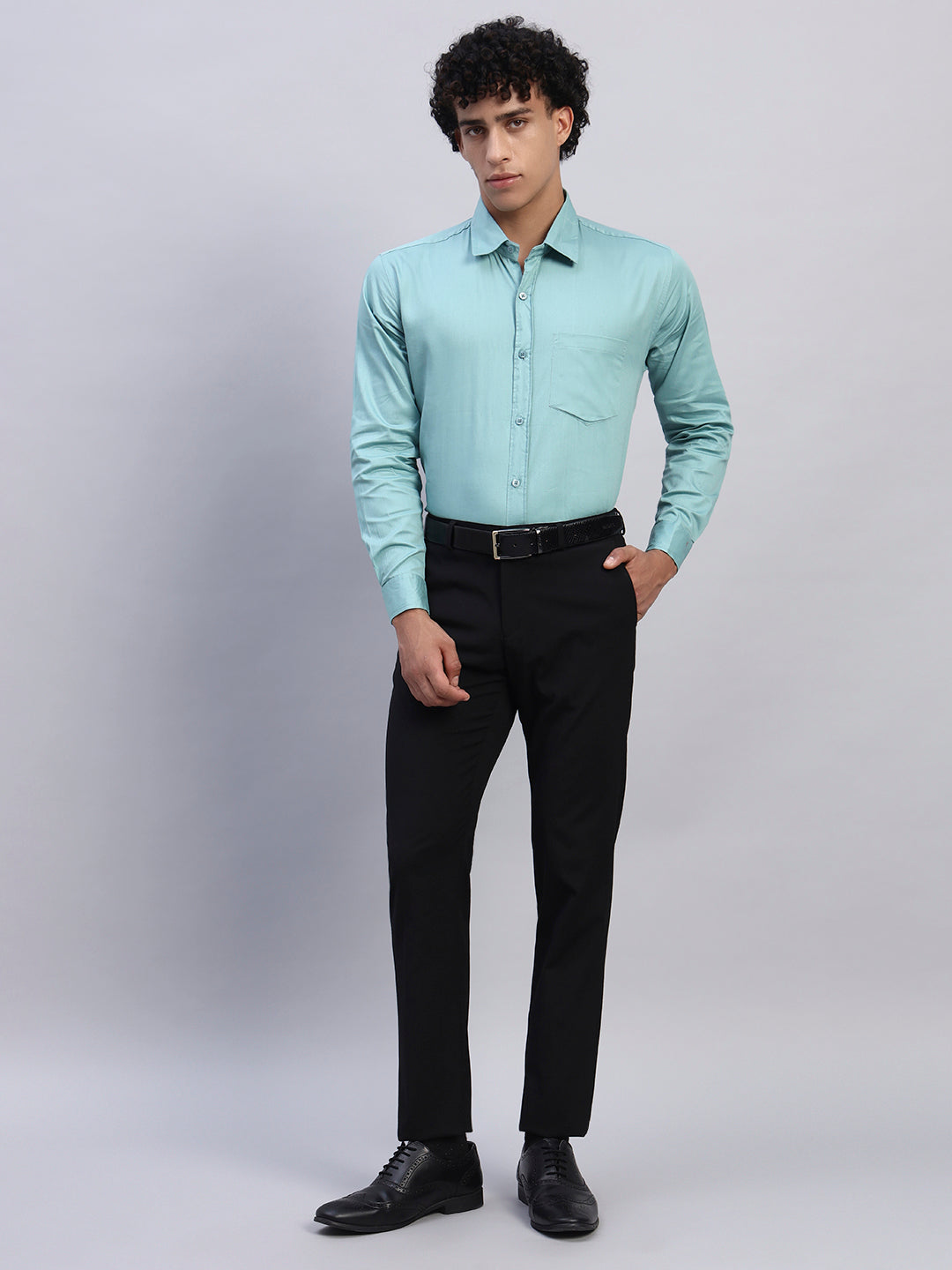 Full look: Men's mint green formal shirt styled with black formal trousers, black leather belt, business bag, and formal shoes — SMOKHEAD business professional outfit