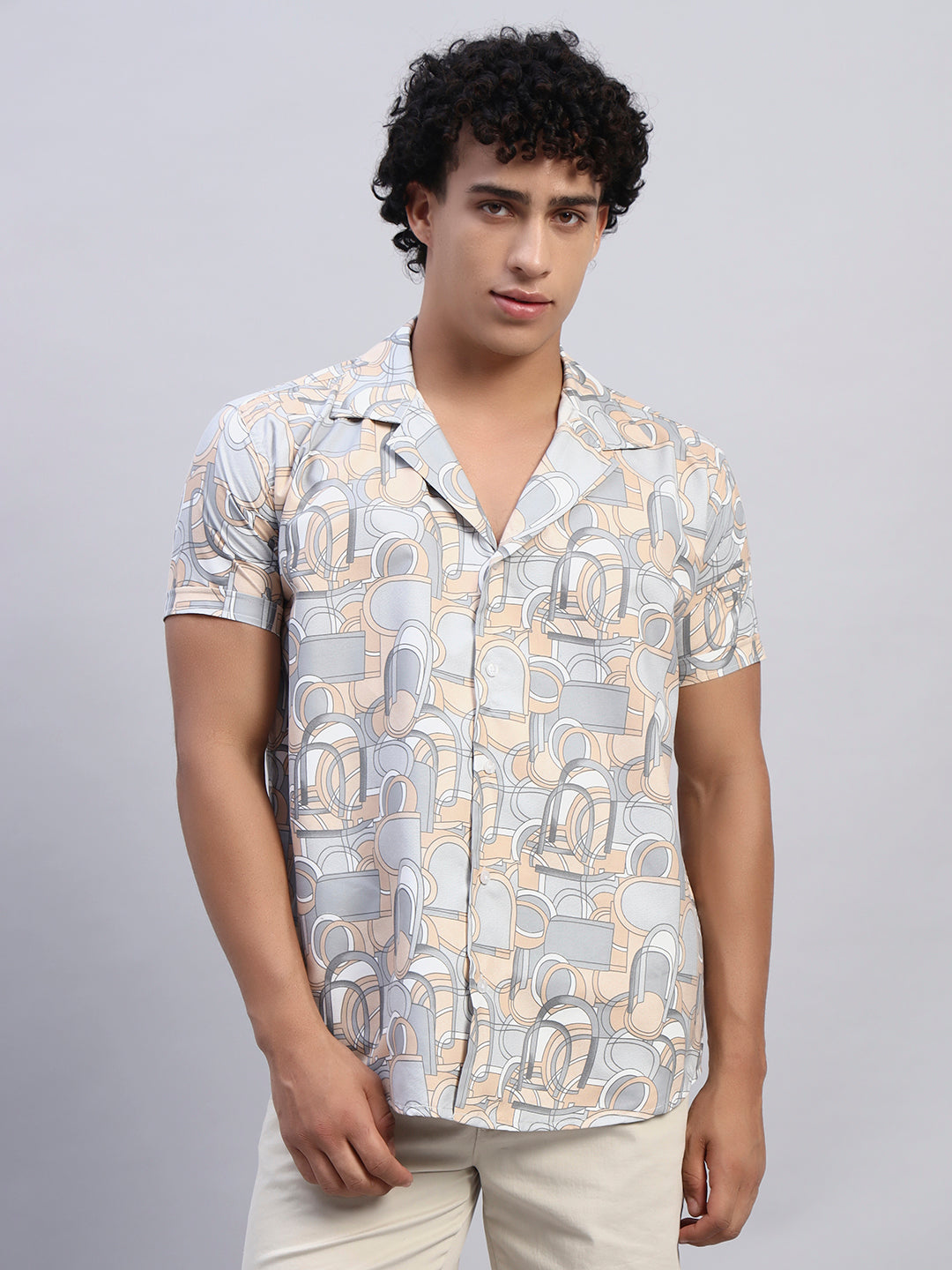Men’s beige and pastel abstract print short-sleeve shirt front view — SMOKHEAD summer resortwear collection