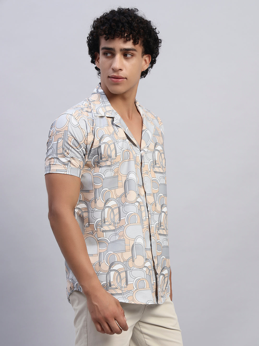 Right side profile of men’s beige and pastel abstract print short-sleeve shirt — SMOKHEAD lightweight casual summer shirt