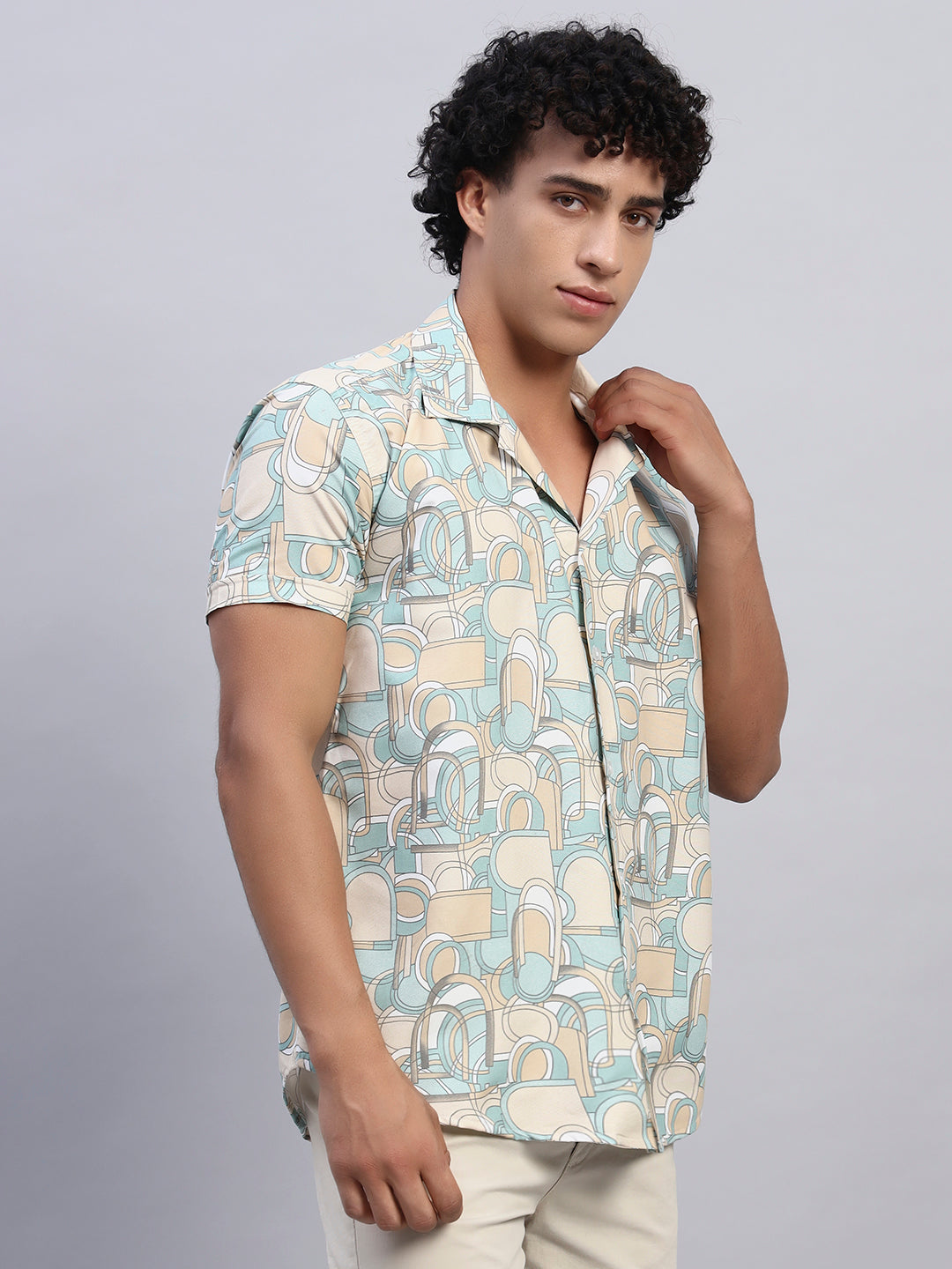 Right side view of men’s beige and pastel abstract patterned short-sleeve shirt — SMOKHEAD resort and casual holiday wear
