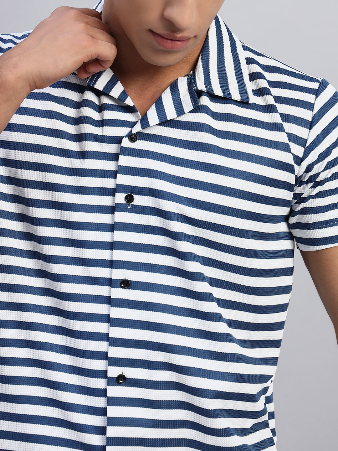 Close-up of navy blue and white horizontal stripe pattern on men's short-sleeve shirt — SMOKHEAD premium fabric details