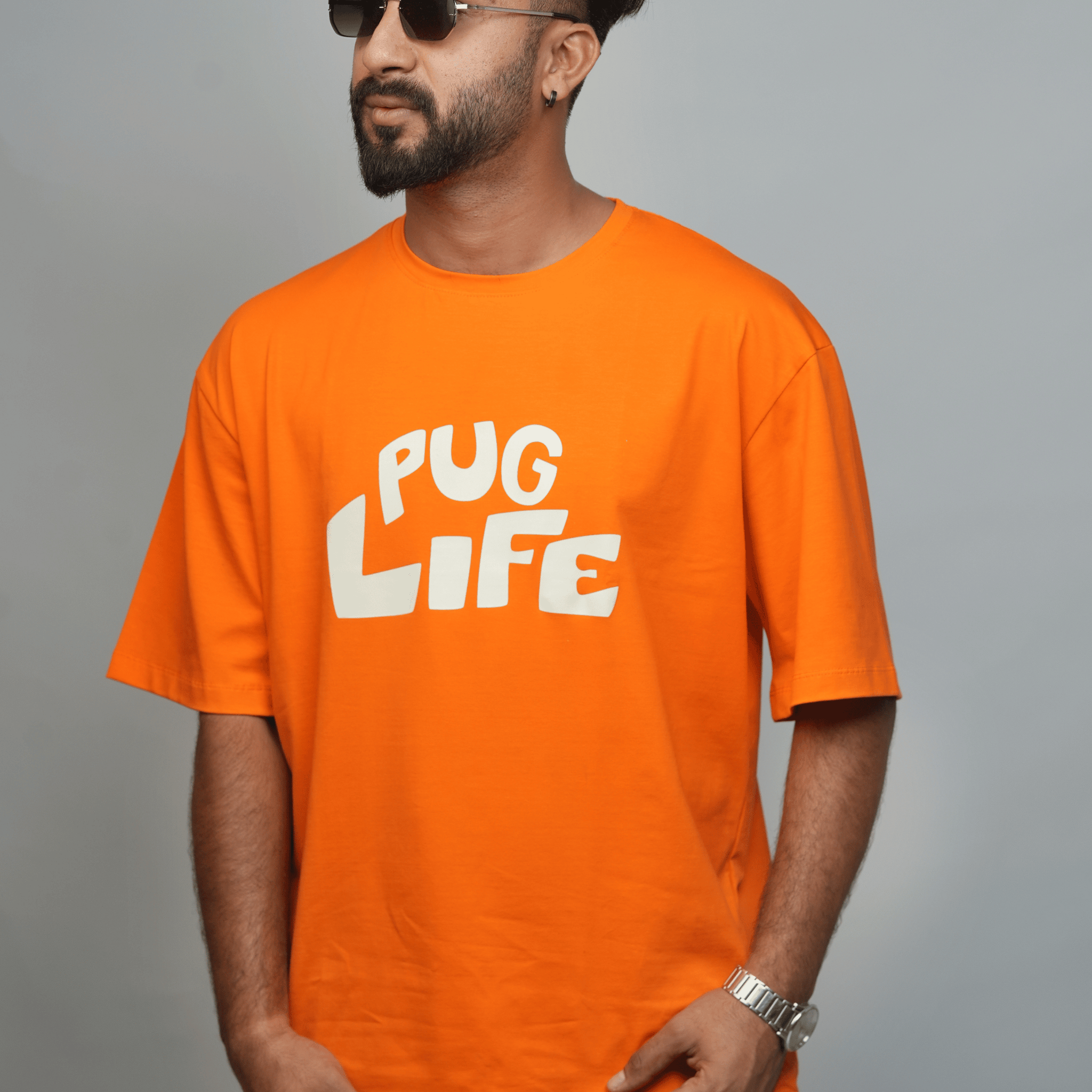 Pug Life: Bold Orange Graphic Tee