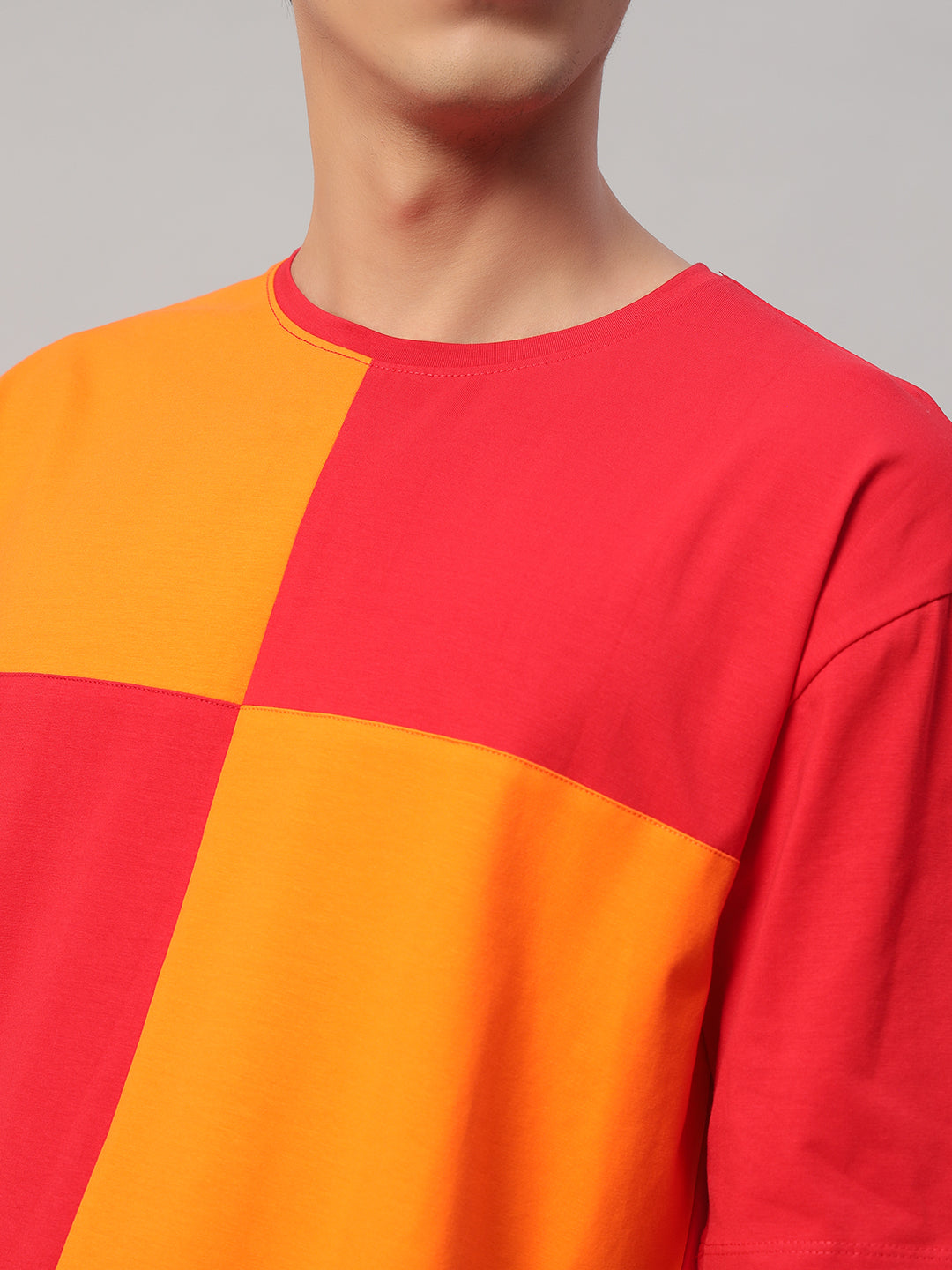 Close-Up – SMOKHEAD Bold Color Block T-Shirt Detailing in Red and Orange with Premium Stitch Finish