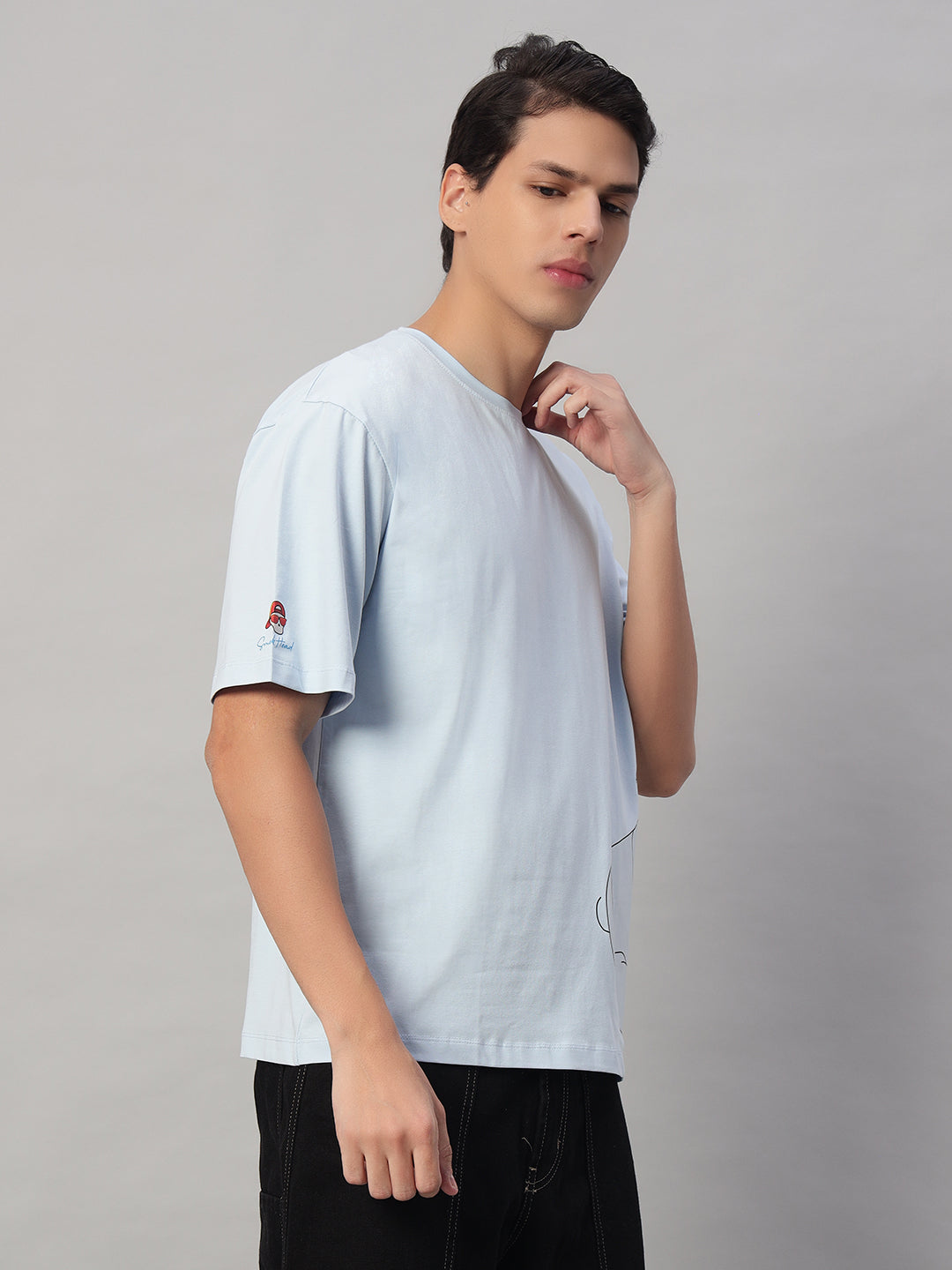 Right Side View – Light Blue SMOKHEAD Oversized Tee for Men | Urban Street Style with Graphic Detail - Arm logo branding