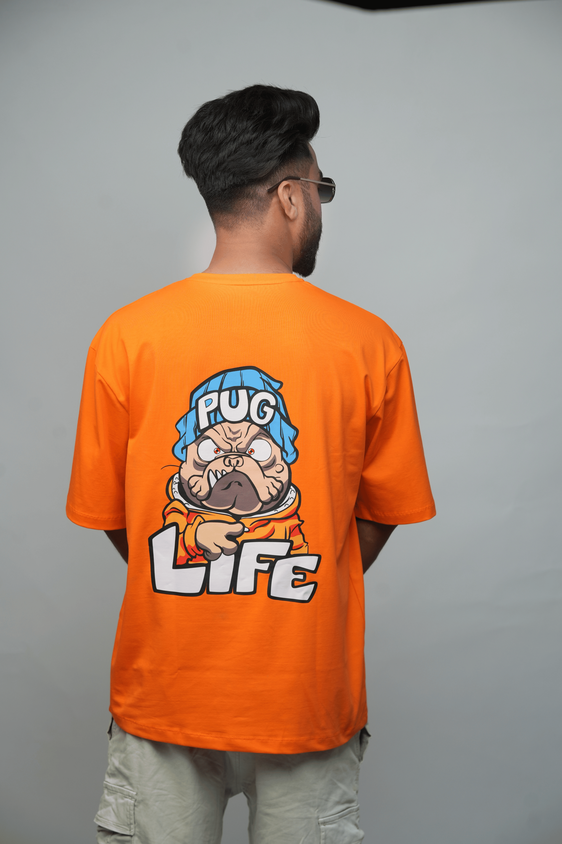 Back View – SMOKHEAD Oversized Orange T-Shirt for Men with Bold 'PUG LIFE' Cartoon Graphic Print | Streetwear Statement Piece