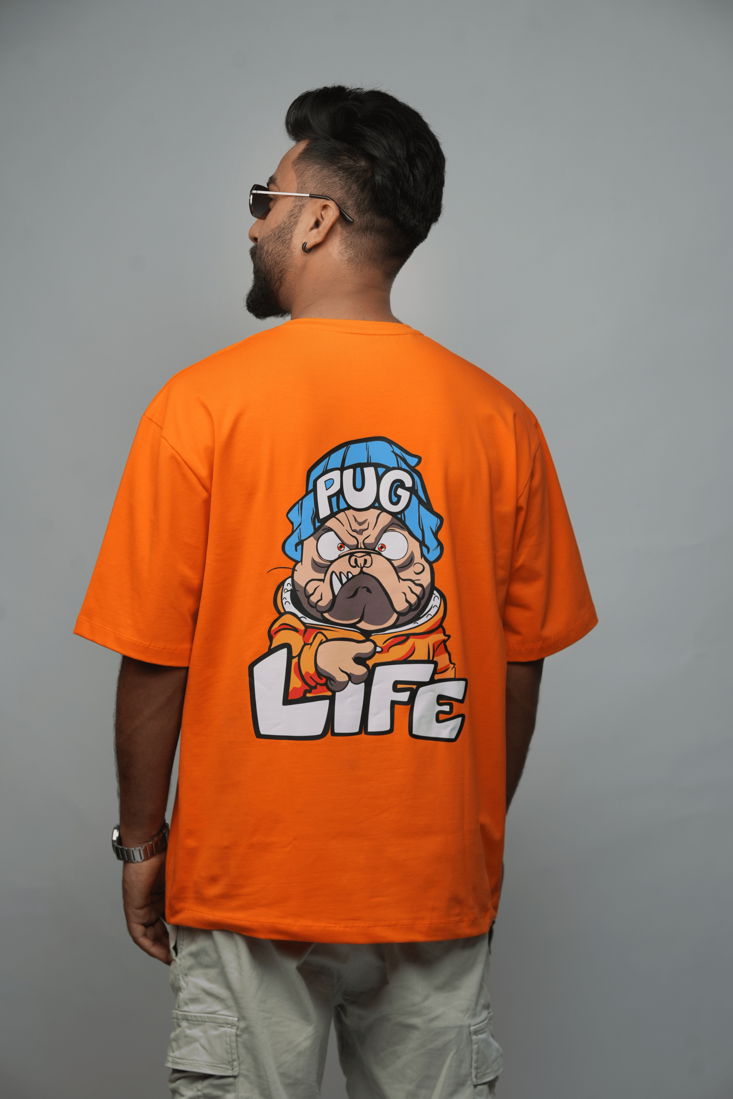 Back View – SMOKHEAD Oversized Orange T-Shirt for Men with Bold 'PUG LIFE' Cartoon Graphic Print | Streetwear Statement Piece