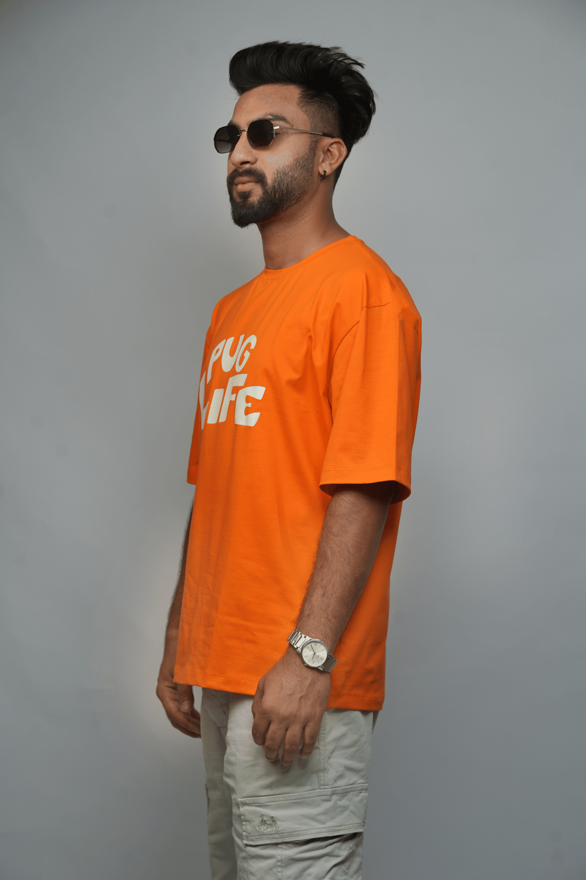 Left Side Profile – SMOKHEAD Bright Orange Men’s T-Shirt with Bold Typography | Street Style Casualwear
