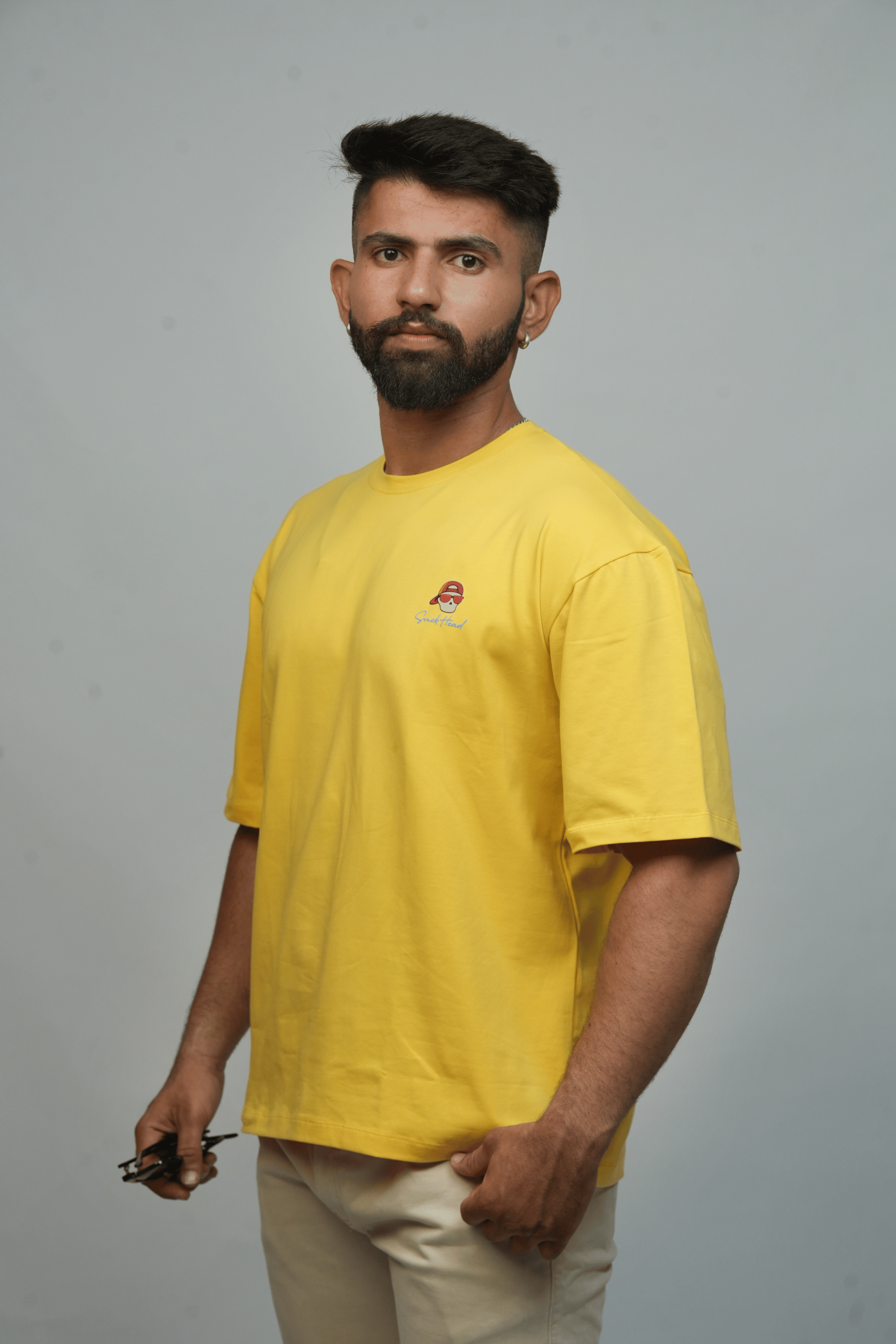 Left Profile – Men’s Yellow T-Shirt by SMOKHEAD with Clean Side Panel and Relaxed Fit | Everyday Street Style