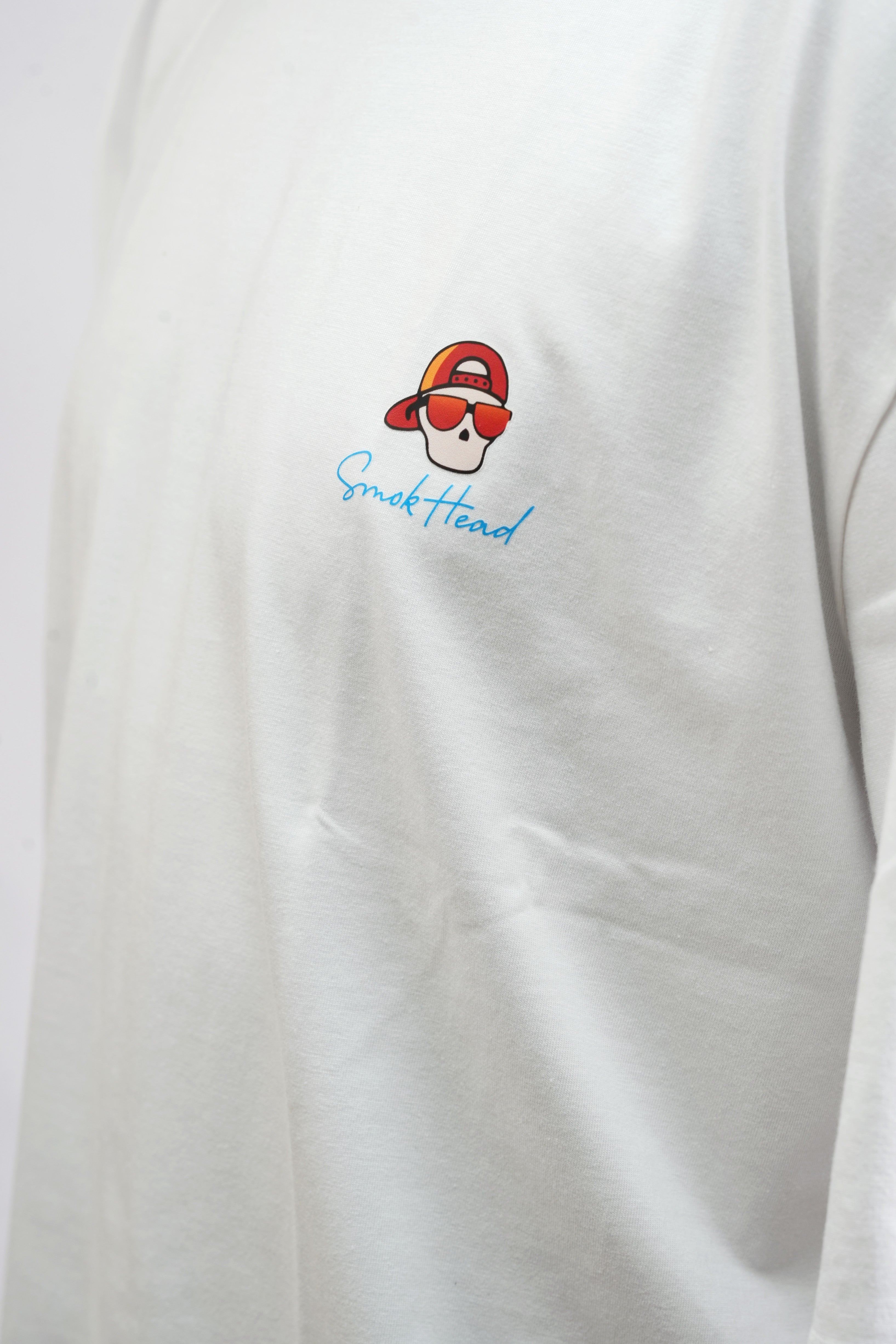 Close-Up – SMOKHEAD White T-Shirt with Small Red Skull Logo Print on Chest and Premium Cotton Finish